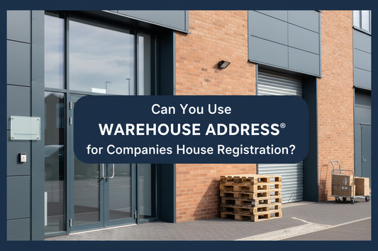 Modern UK trading-estate entrance with roller shutter, wrapped pallets and parcel trolley, with a banner reading “Can You Use Warehouse Address® for Companies House Registration?”