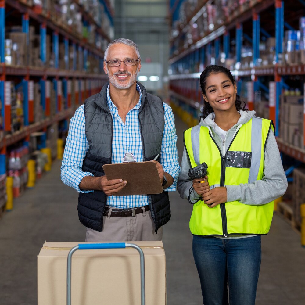 Large warehouse with stacked pallets representing Enterprise Plan.